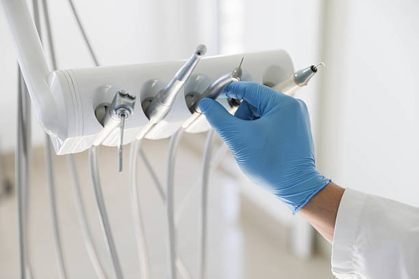 Professional Invisalign Clear Aligners technician working in Oak Ridge, NC